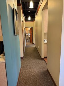 Hallway leading to offices and treatment rooms