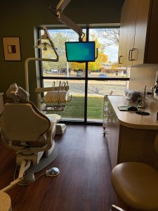Treatment room at Green Dental with a dental chair